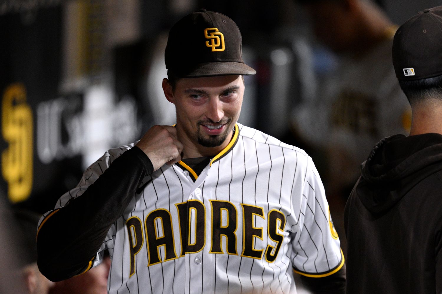 Sep 19, 2023; San Diego, California, USA; San Diego Padres starting pitcher Blake Snell (4) looks on from the dugout during the eighth inning against the Colorado Rockies at Petco Park. Mandatory Credit: Orlando Ramirez-USA TODAY Sports  